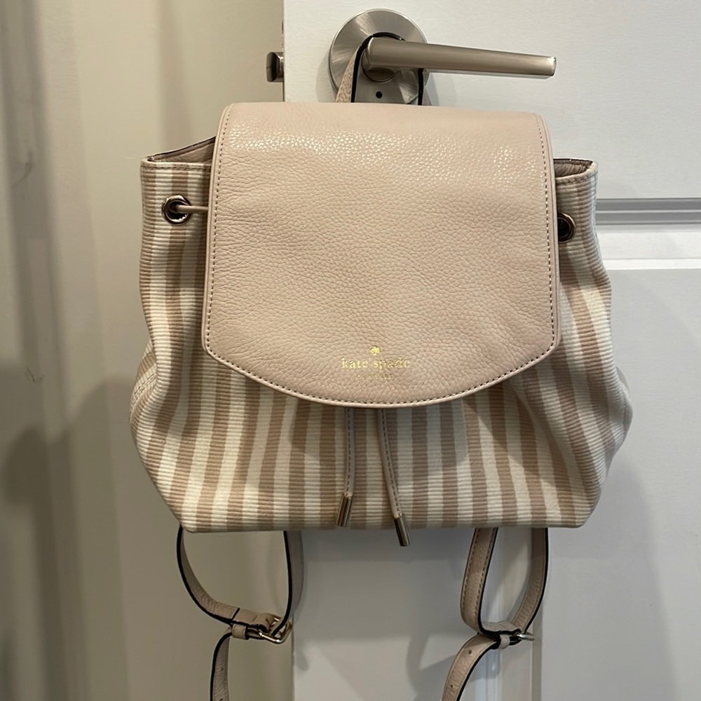 Blush like new KATE SPADE mini back purse